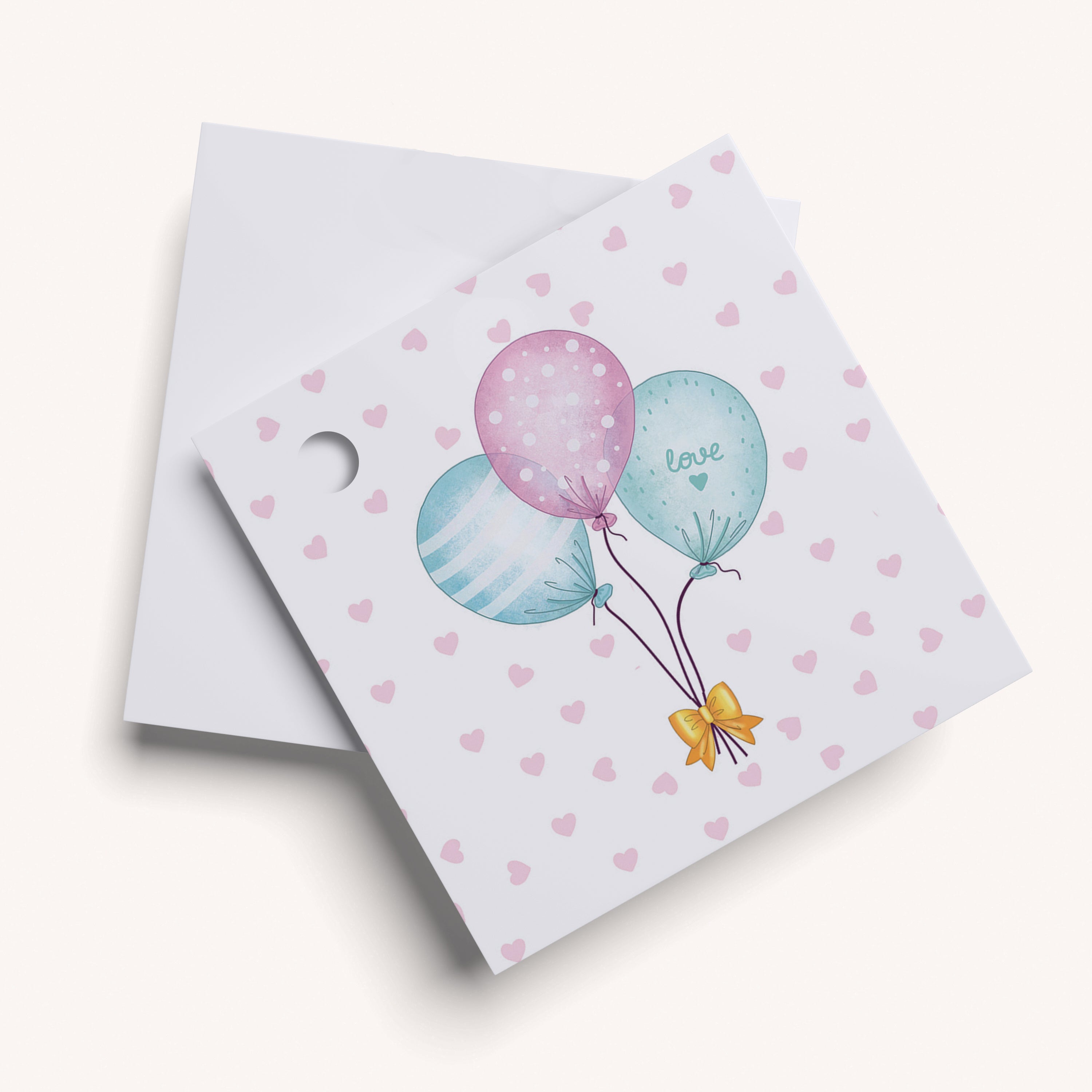 White gift name tag with balloons and hearts.
