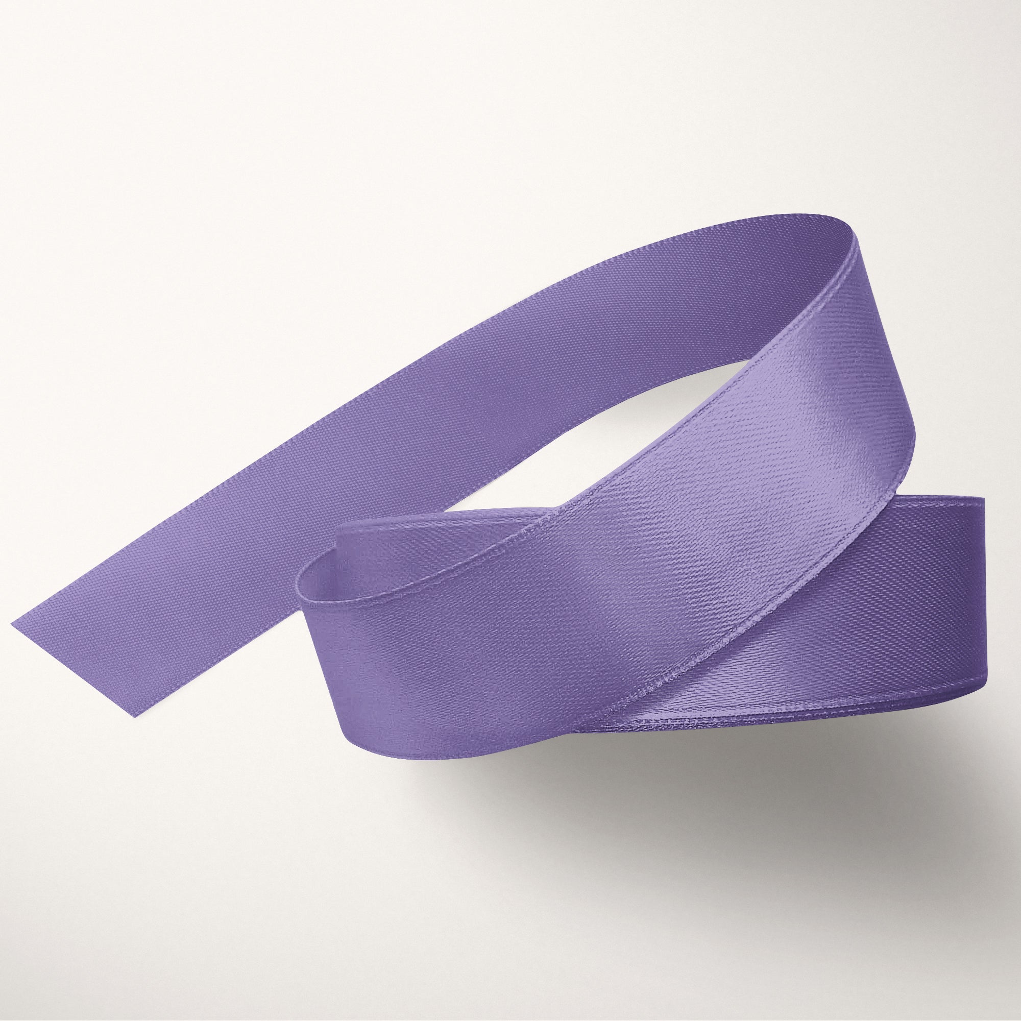 Purple ribbon on a white background