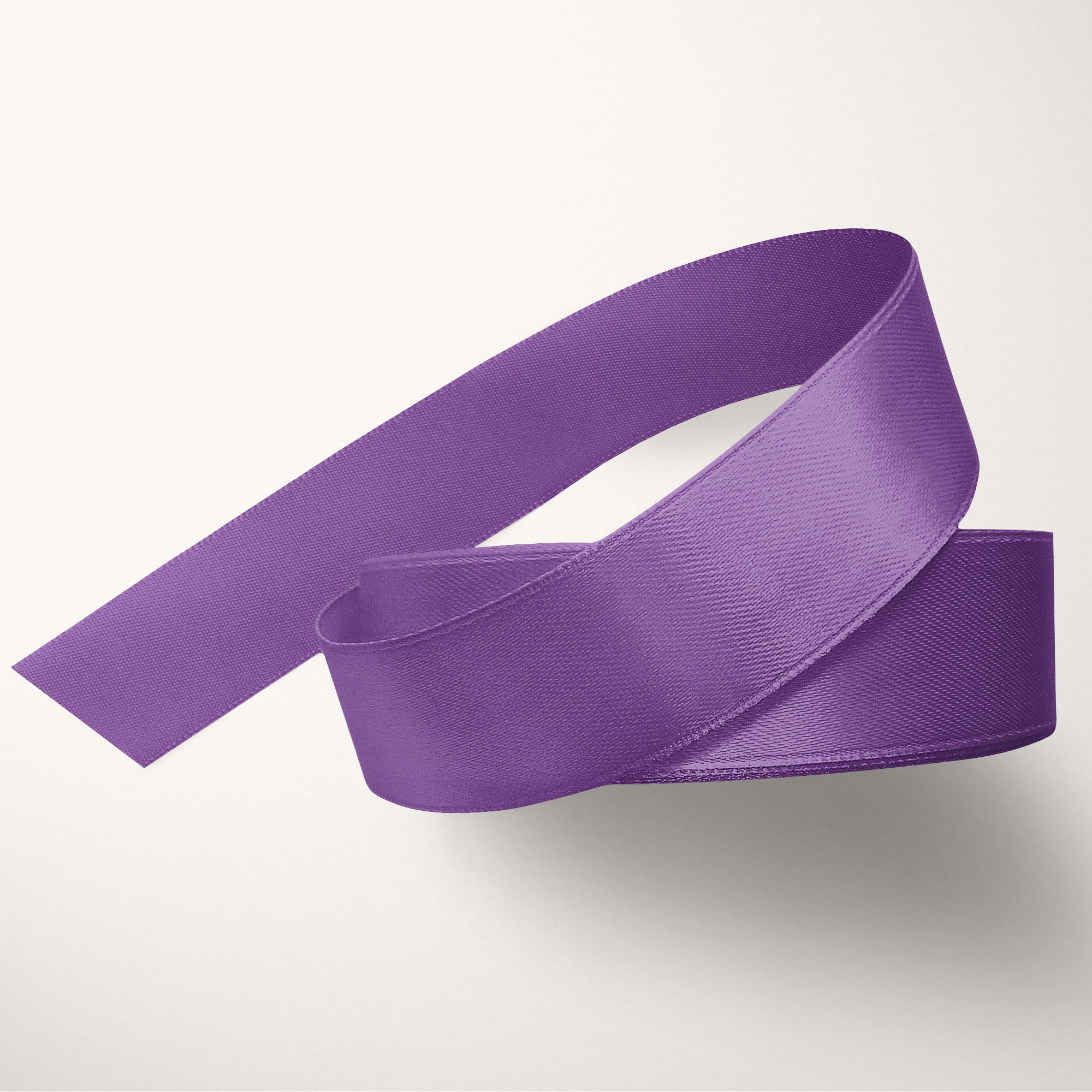 Magneta Purple ribbon on a white background