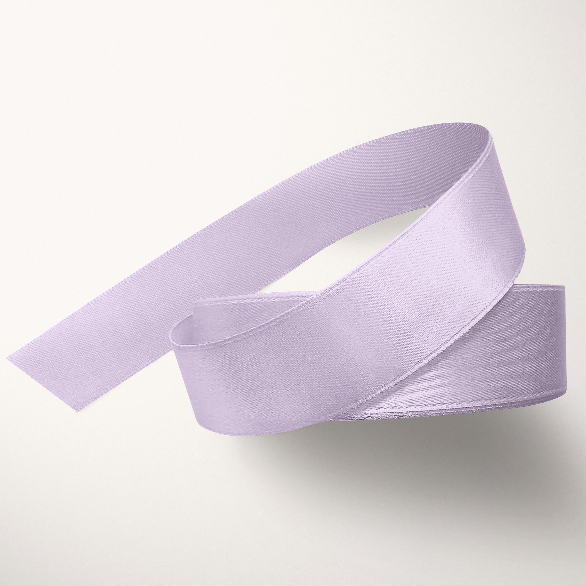 Light purple ribbon on a light gray background