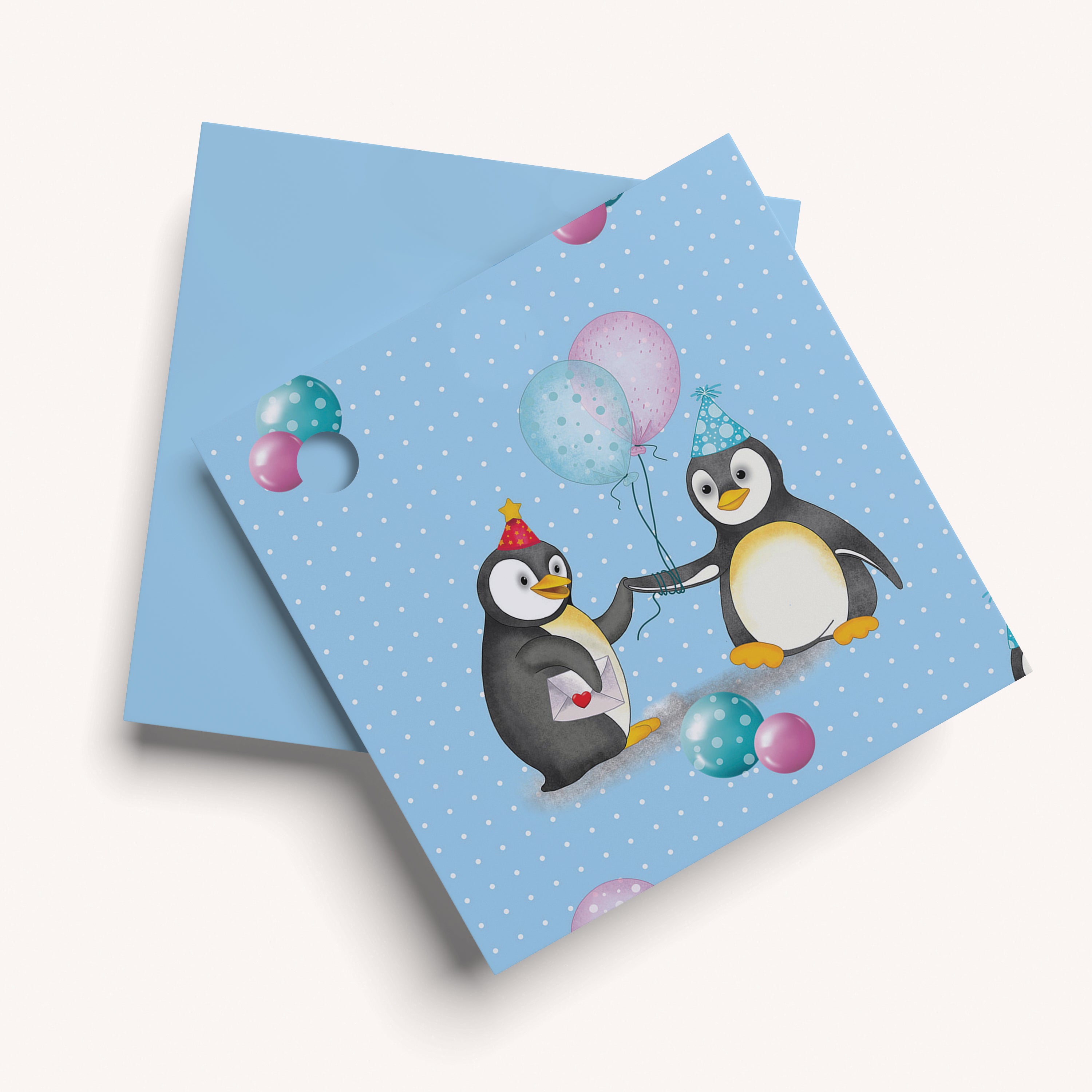 two penguin and balloon design on blue gift name tag.