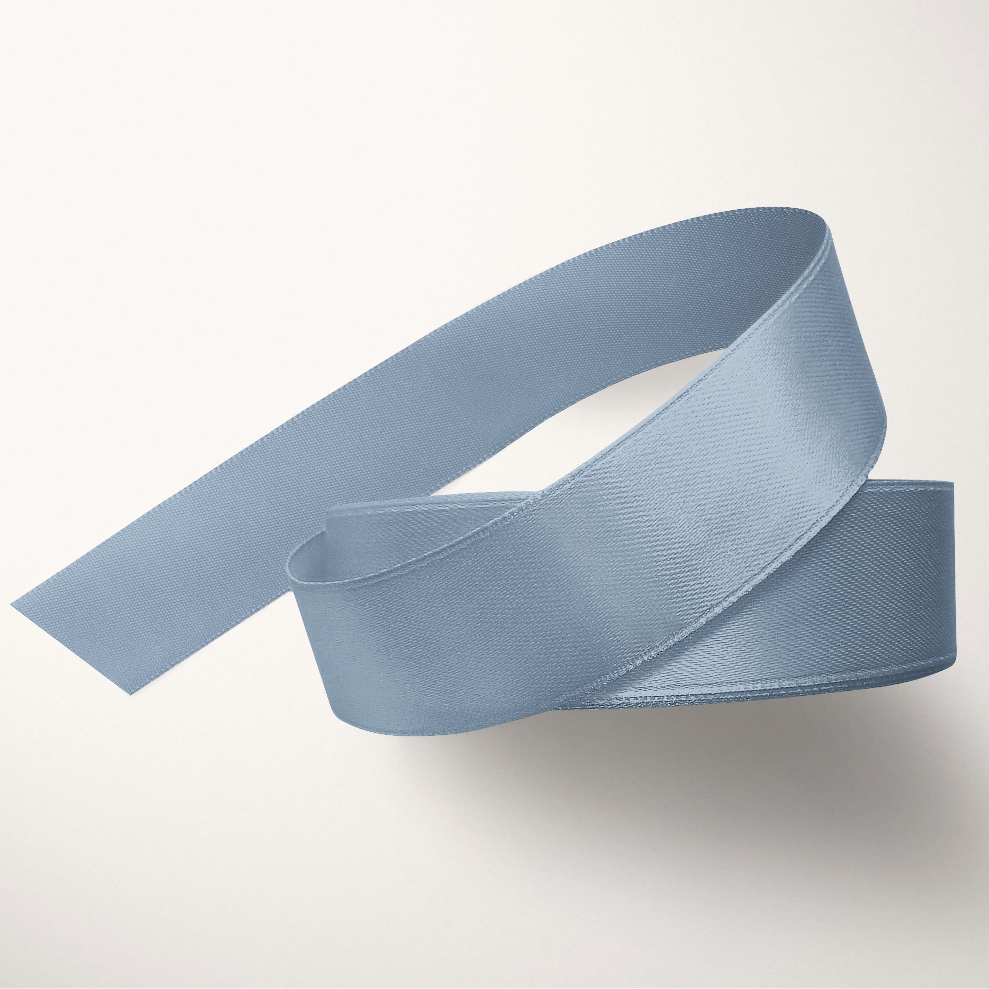 Luxurious double-faced satin ribbon in rock blue color.