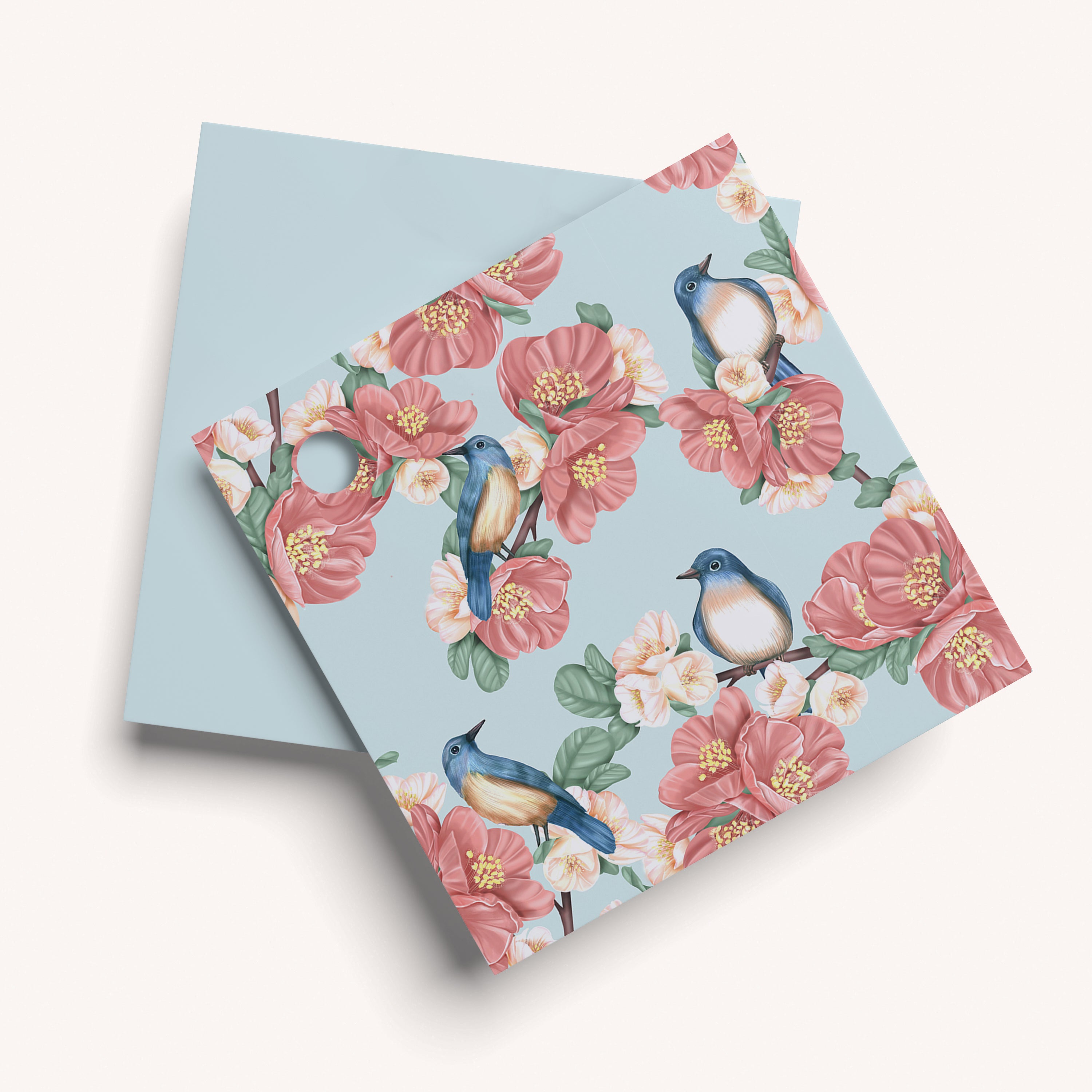 Floral card with birds on a light blue background