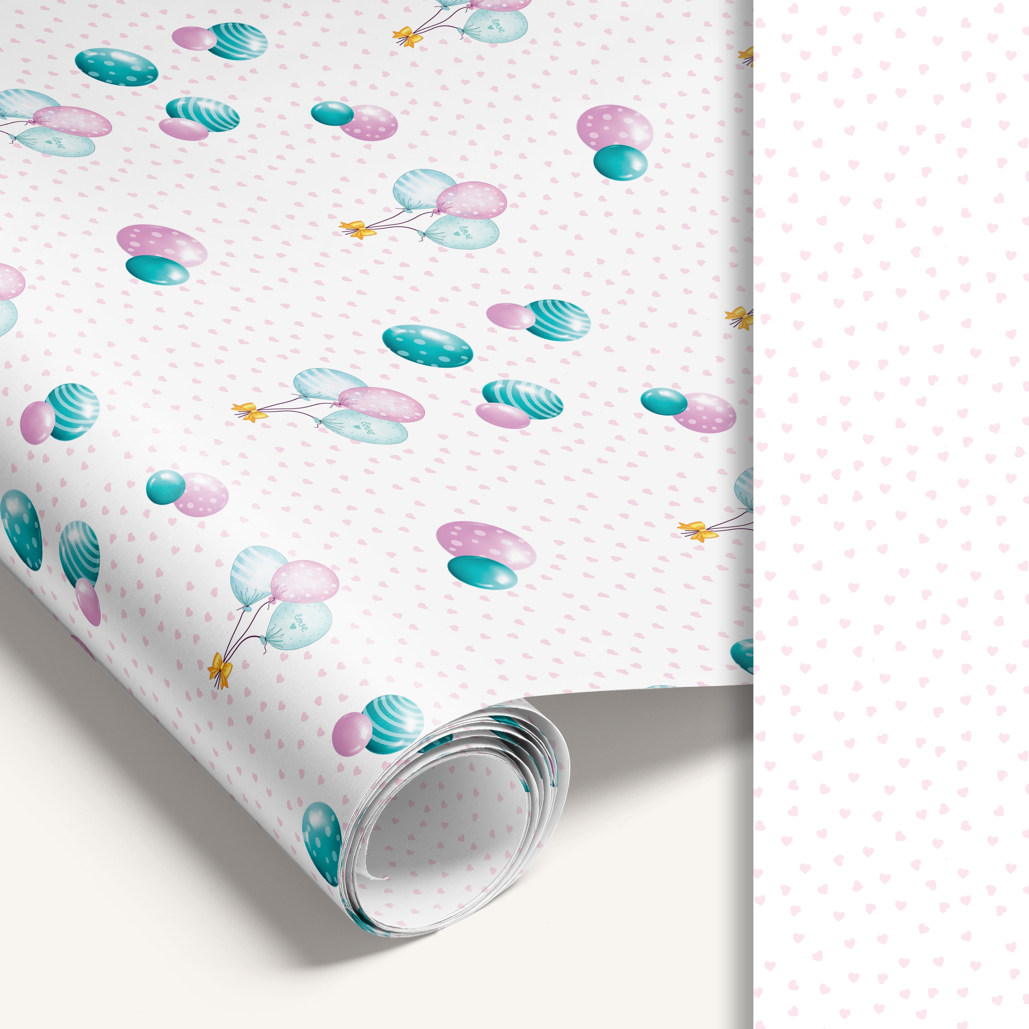 White balloon wrapping paper roll with heart pattern reverse side.
