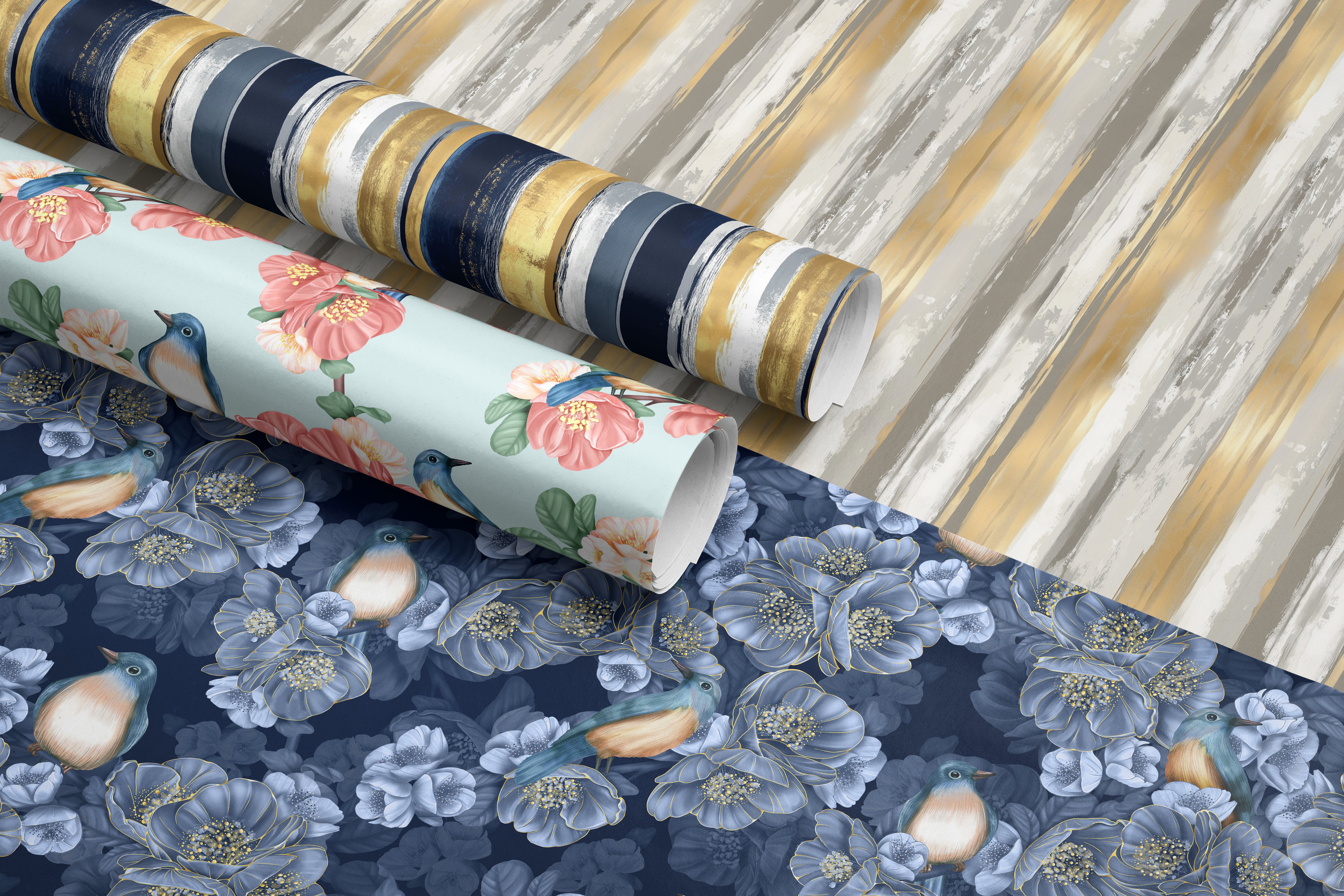 Three rolls of floral wallpaper on a striped background