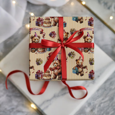 Gift wrapped in vintage yellow stripped birthday teddy bear gift wrap with red ribbon