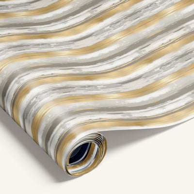 Gilded Brush double-sided wrapping paper featuring gold and gray stripes on one side and silver and navy stripes on the reverse.