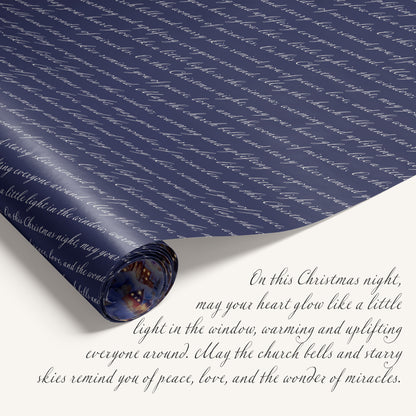 Double-sided winter village wrapping paper featuring a twilight village illustration on one side and holiday text on the reverse.