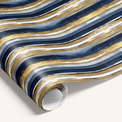 “Modern Tux” single-sided wrapping paper from the Petite Luxe collection featuring navy, gold, and gray brush-stroke stripes.