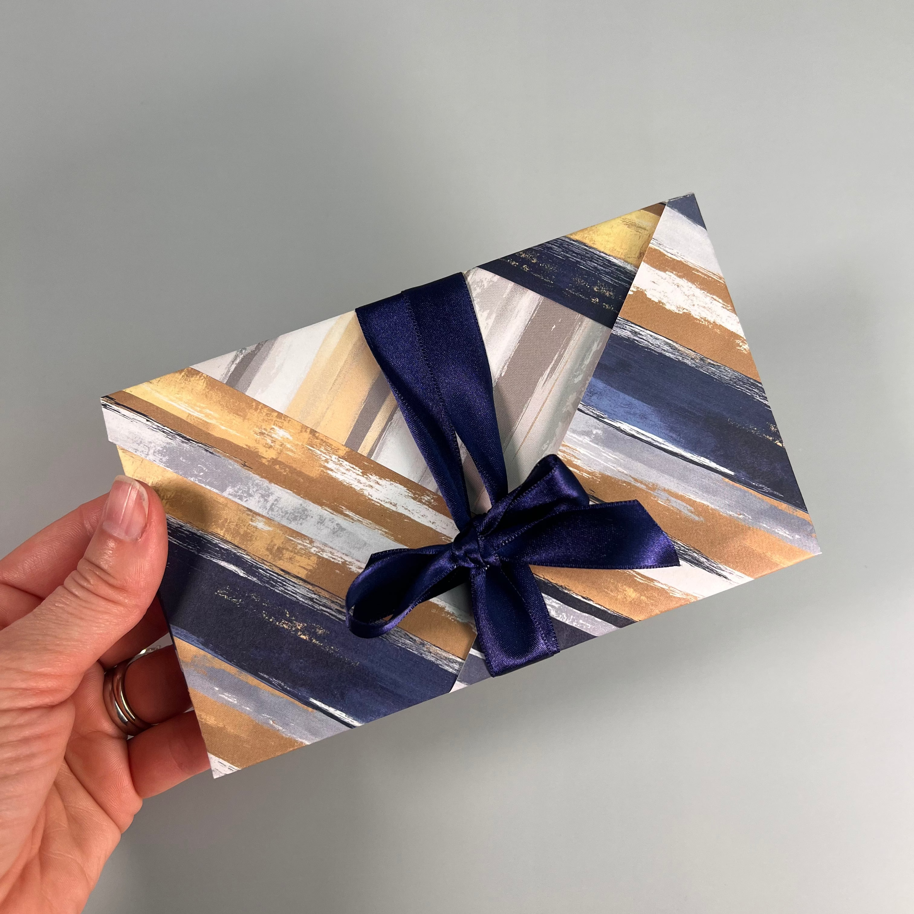 blue and gold tone wrapping paper envelope