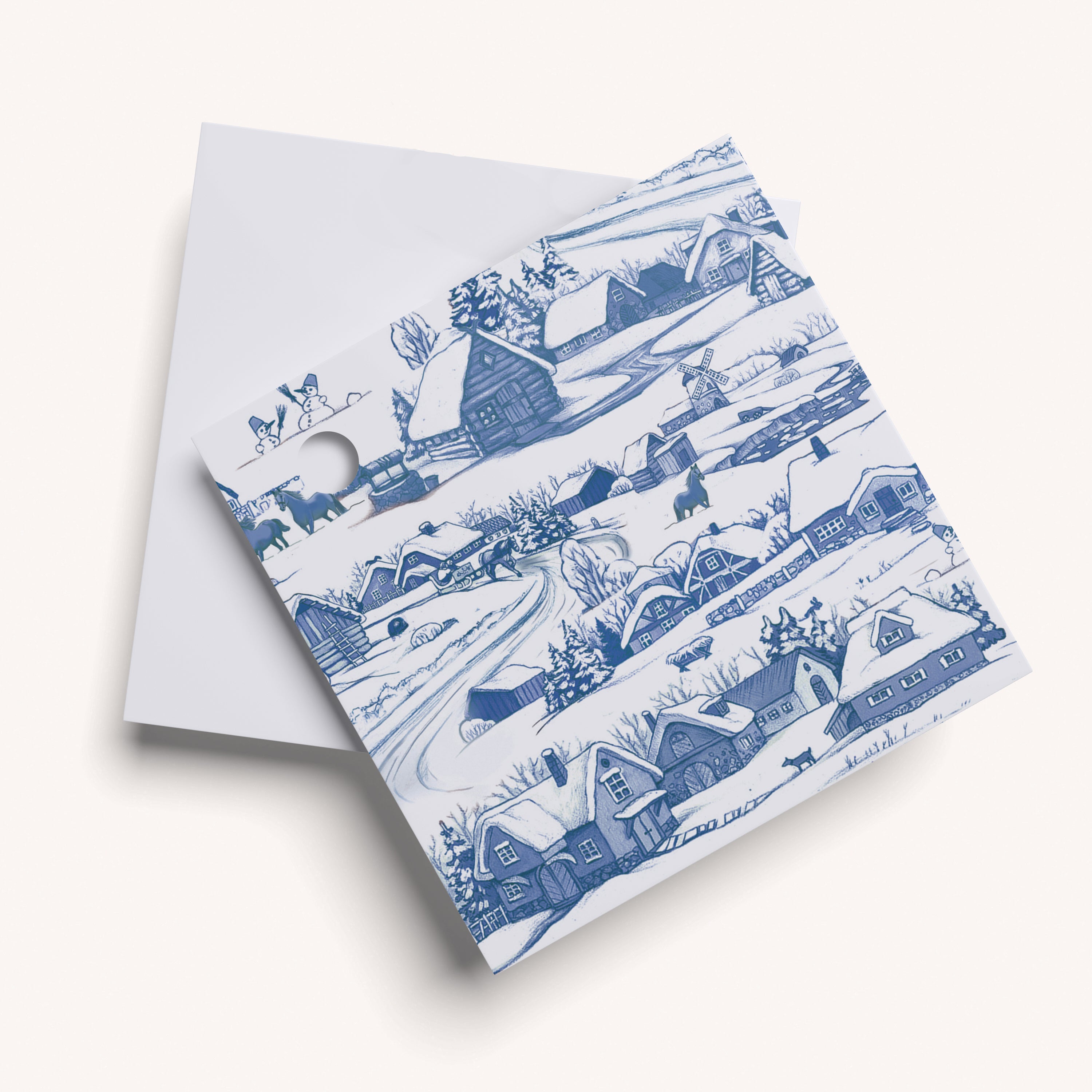 Name tag with blue village design on white background