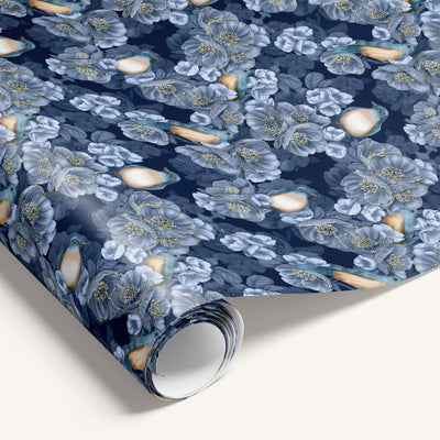 Floral patterned paper with blue flowers and birds on a white background