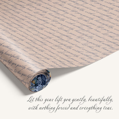 Roll of paper with handwritten text and a quote at the bottom.