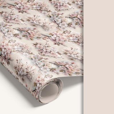 Roll of floral wallpaper with cherry blossoms on a neutral background